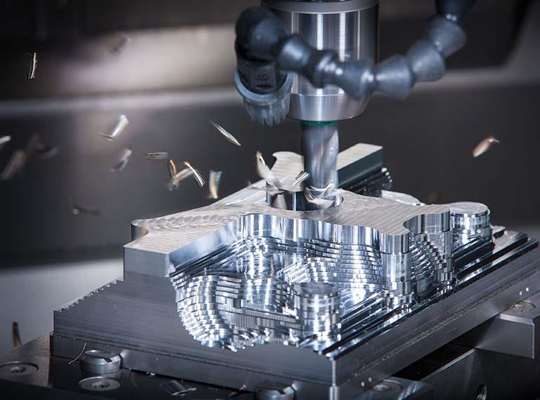 What are the features of CNC machining Centre